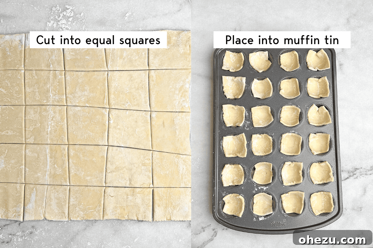 Puff pastry dough cut into squares and the squares placed into a mini muffin tin, ready for filling