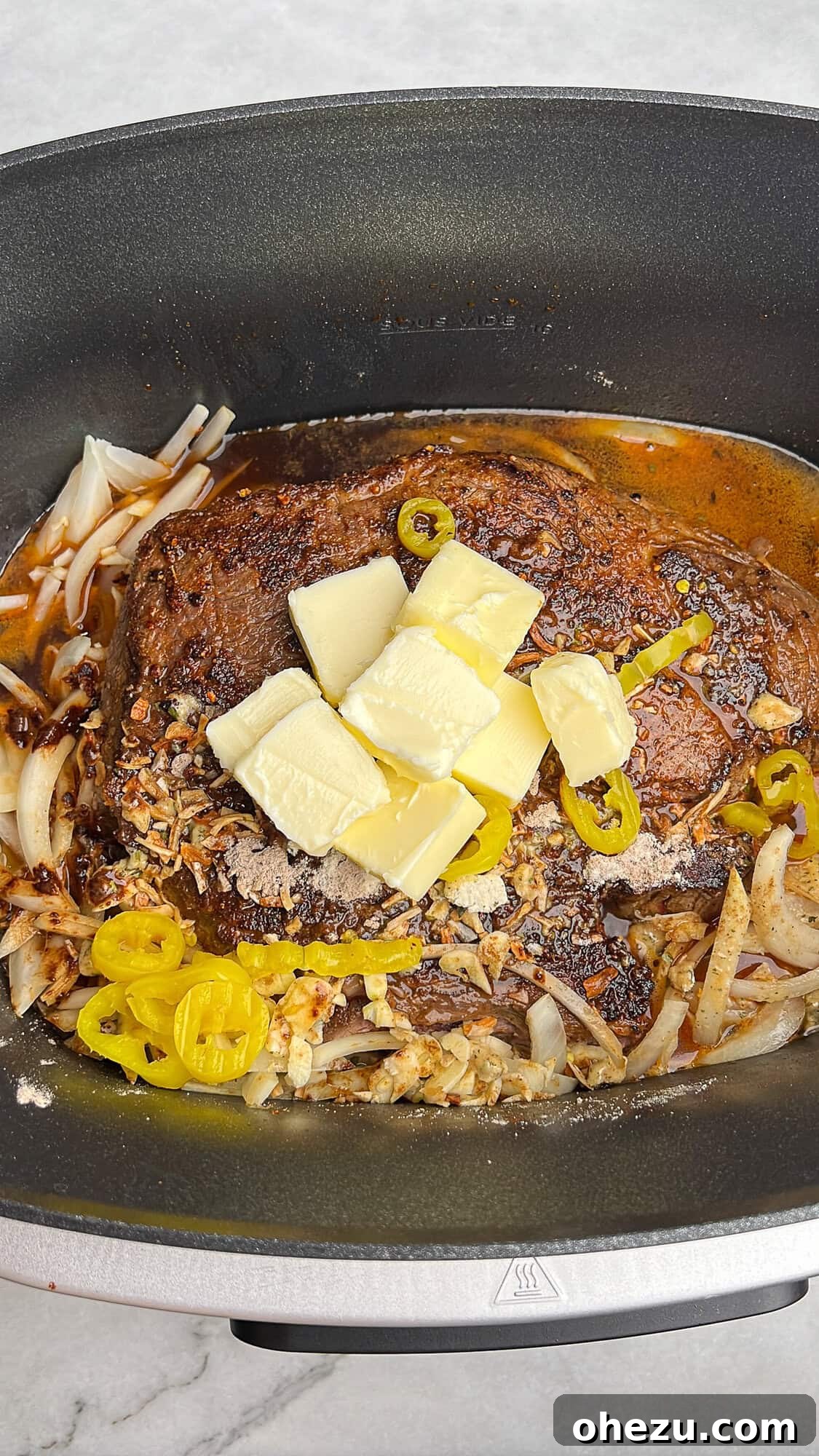 Key ingredients for Mississippi pot roast neatly arranged inside a slow cooker before cooking, ready to be combined.