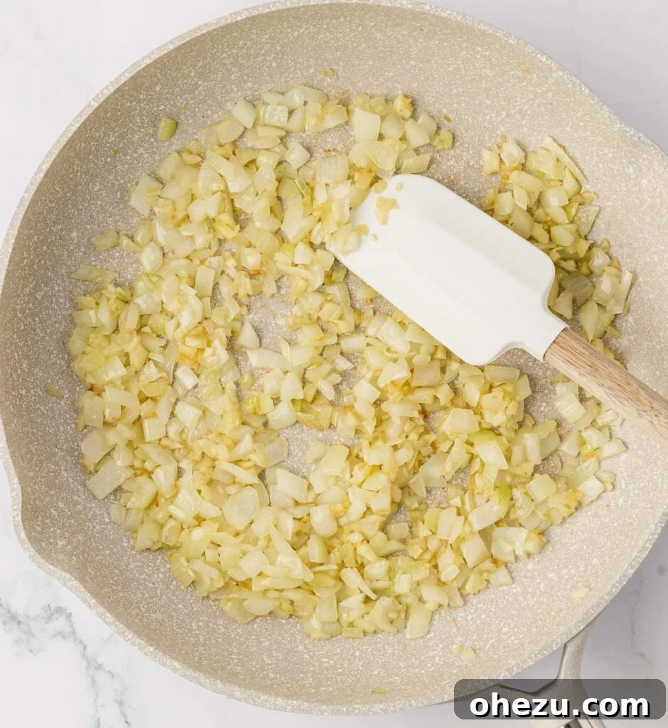 Sautéing garlic and onion in butter until softened