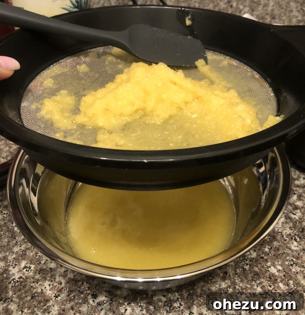 The Authentic Disney Dole Whip Recipe You've Been Waiting For 5 Straining Dole Whip Pineapple Syrup