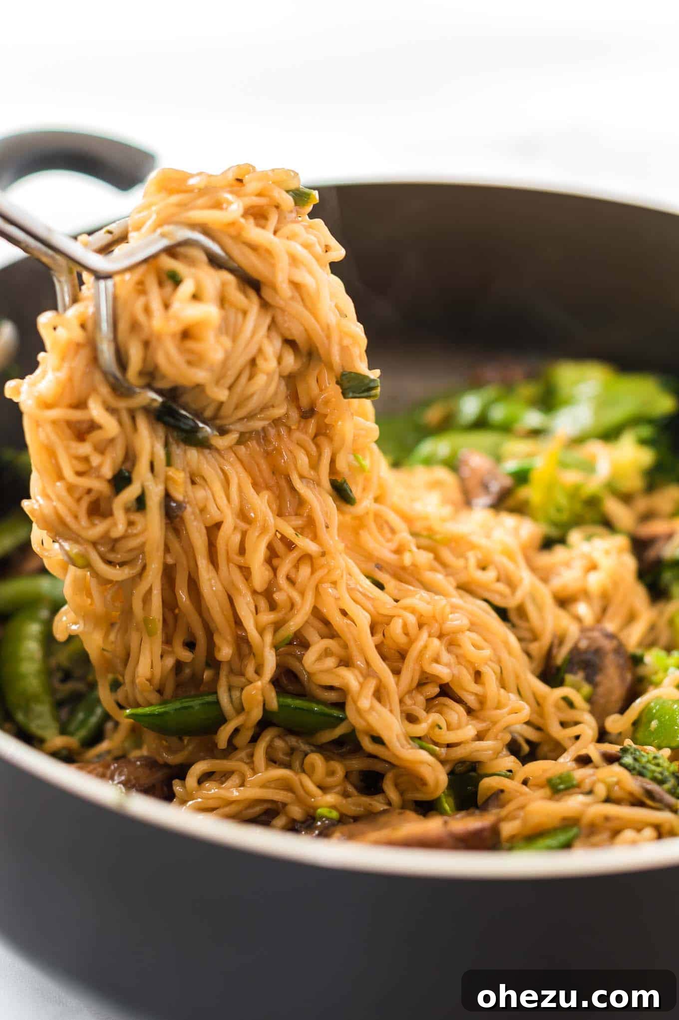 Sweet and Savory Teriyaki Noodles 9 Another perspective of a serving of Teriyaki Ramen Noodles, highlighting the texture and fresh ingredients.