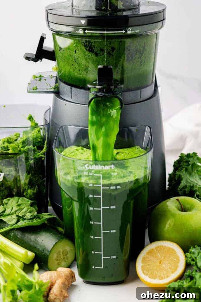 Vibrant Green Goodness 5 Vibrant green juice pouring out of a juicer spout into a collection pitcher.