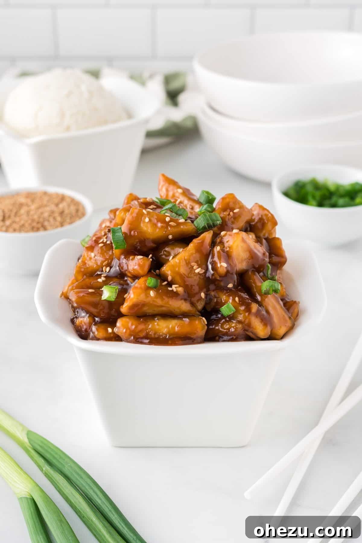 takeout container filled with teriyaki tofu
