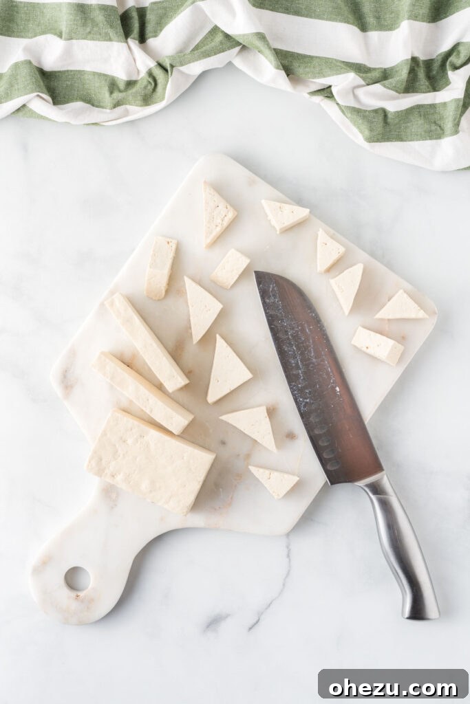 cutting the tofu into triangles
