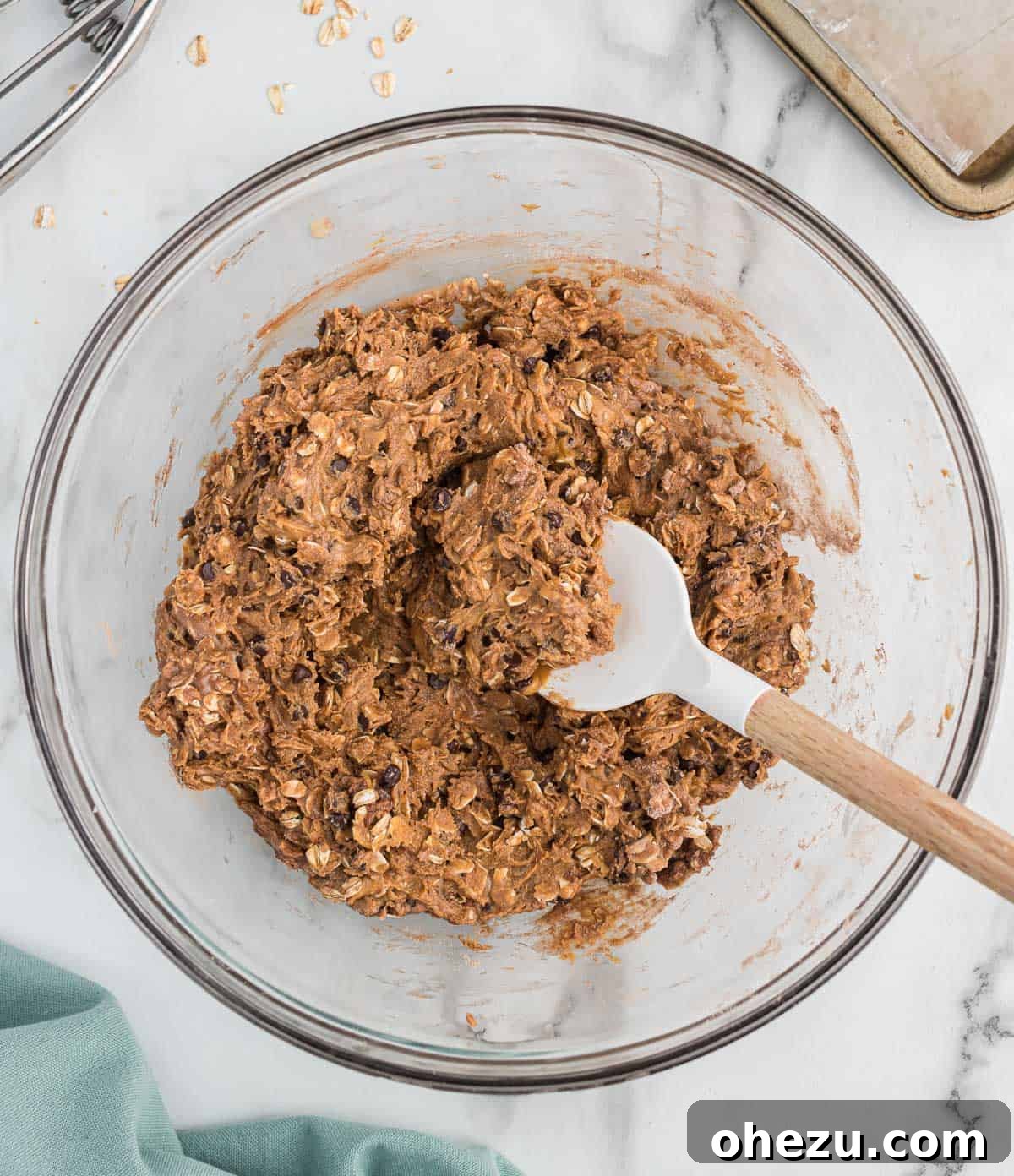 protein ball batter mixed together with a rubber spatula