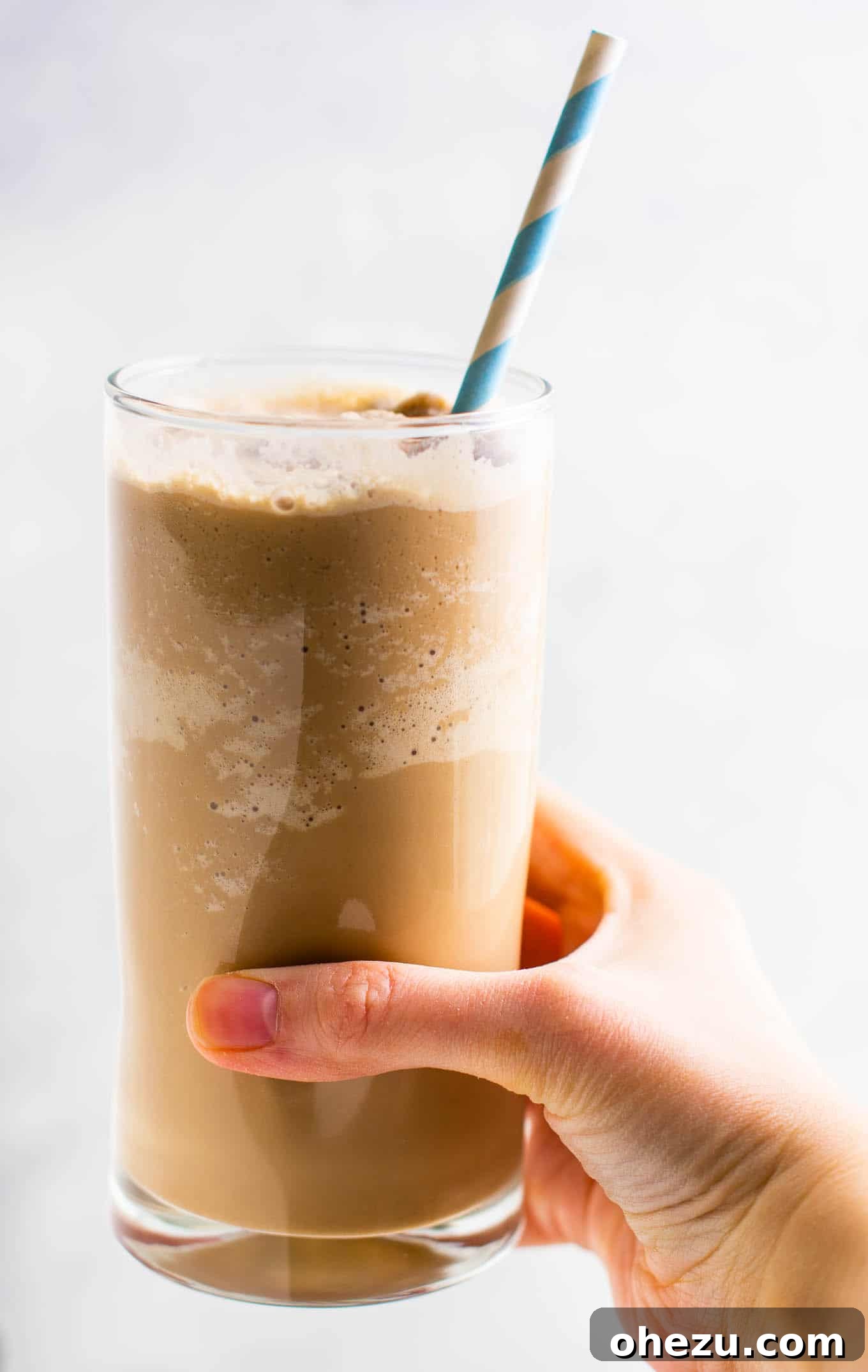 Creamy, blended frozen coffee in a clear glass
