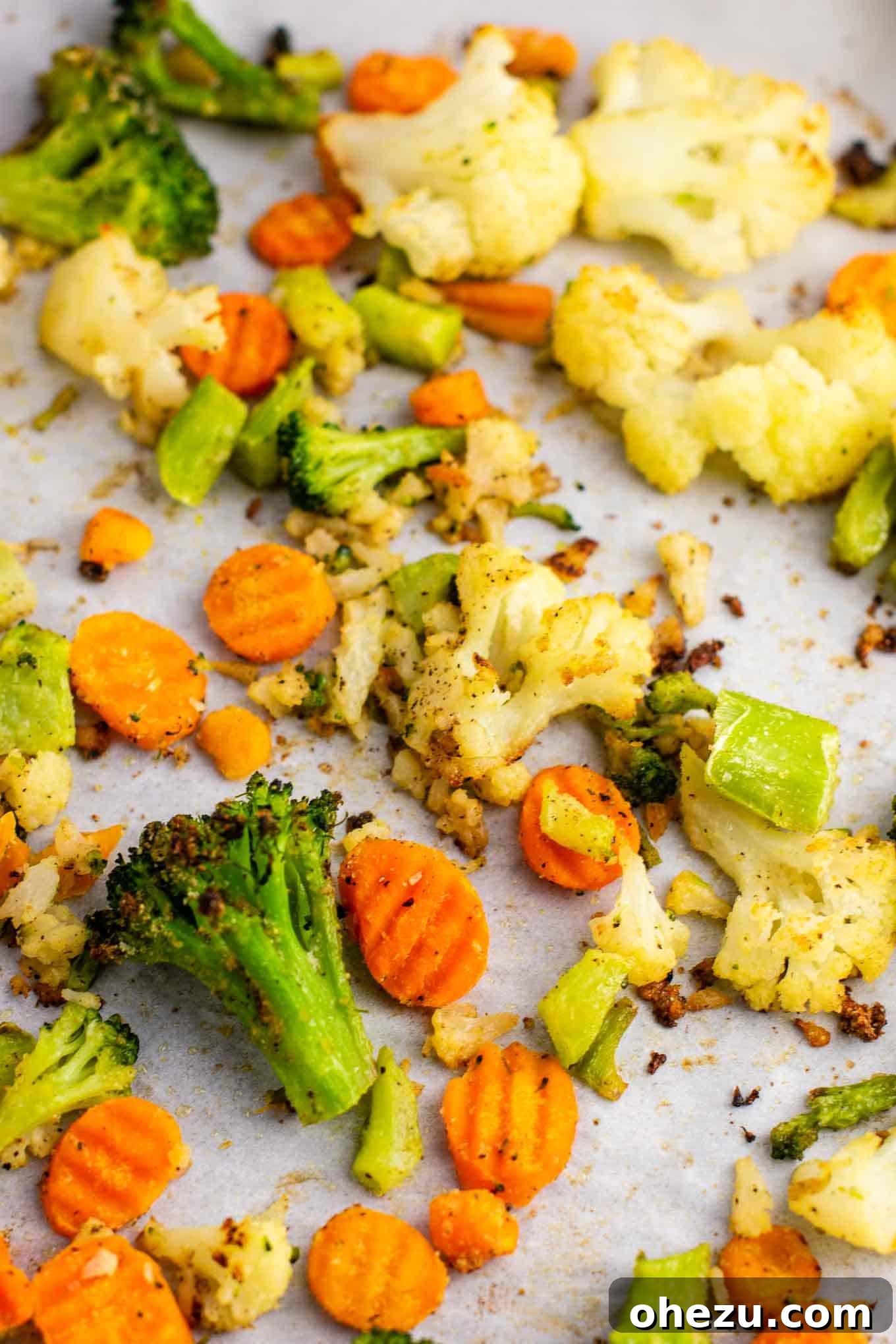 Freshly cooked, crispy air fryer frozen vegetables on a white background, ready to be served