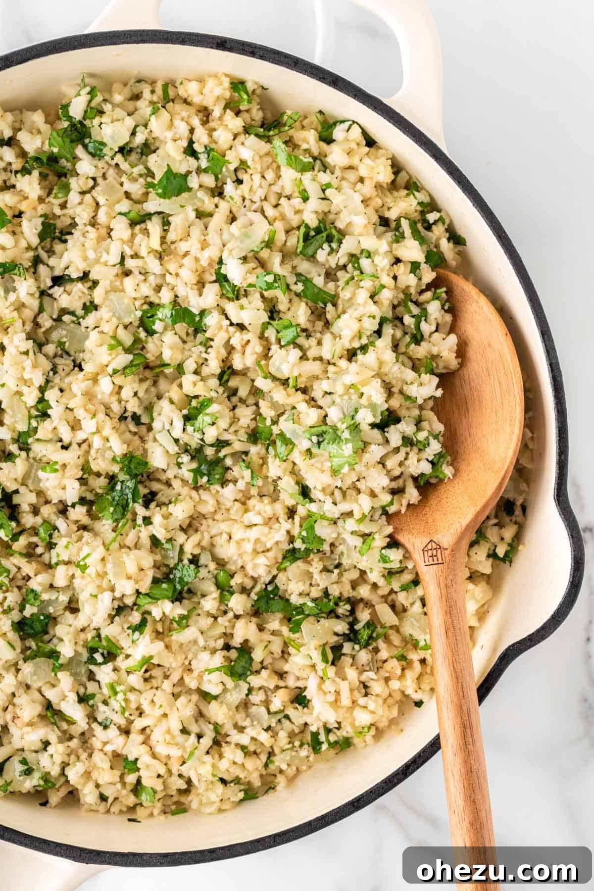 stirring the cauliflower rice