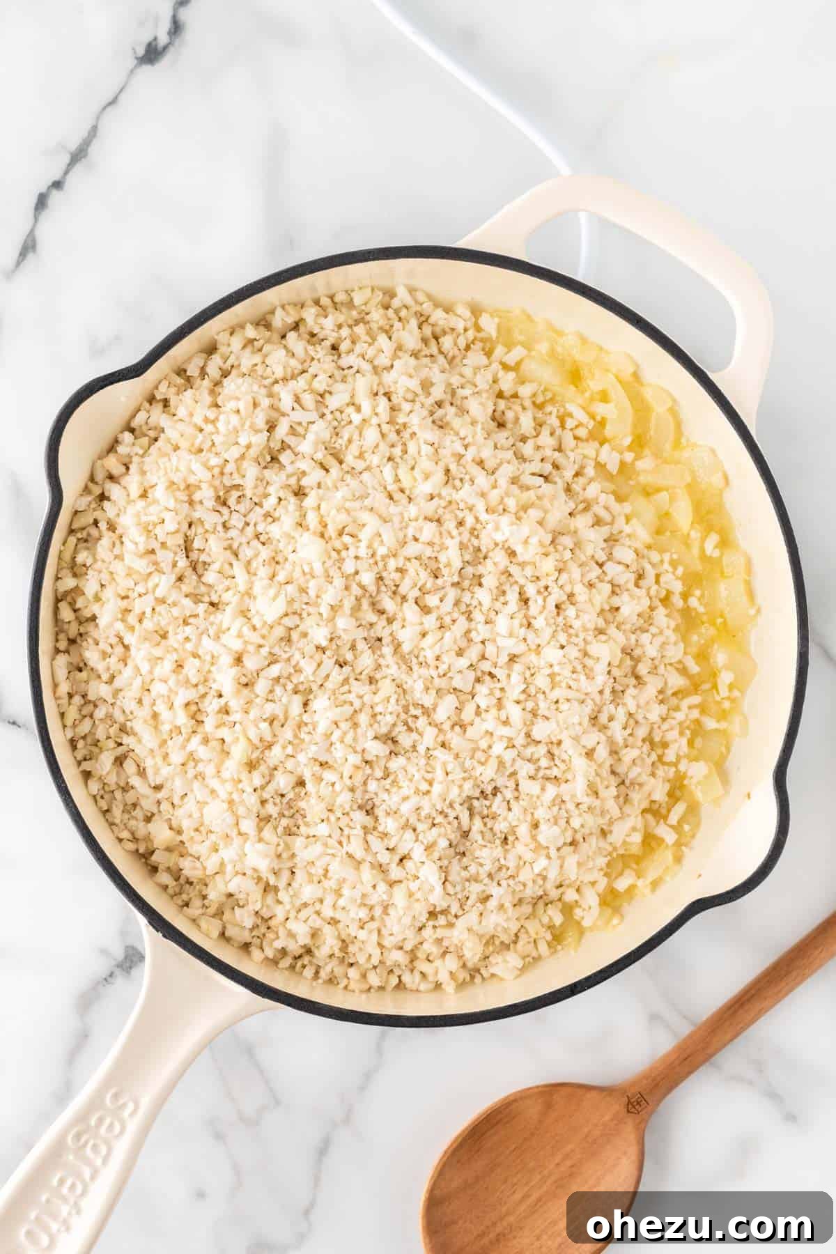 adding the cauliflower rice