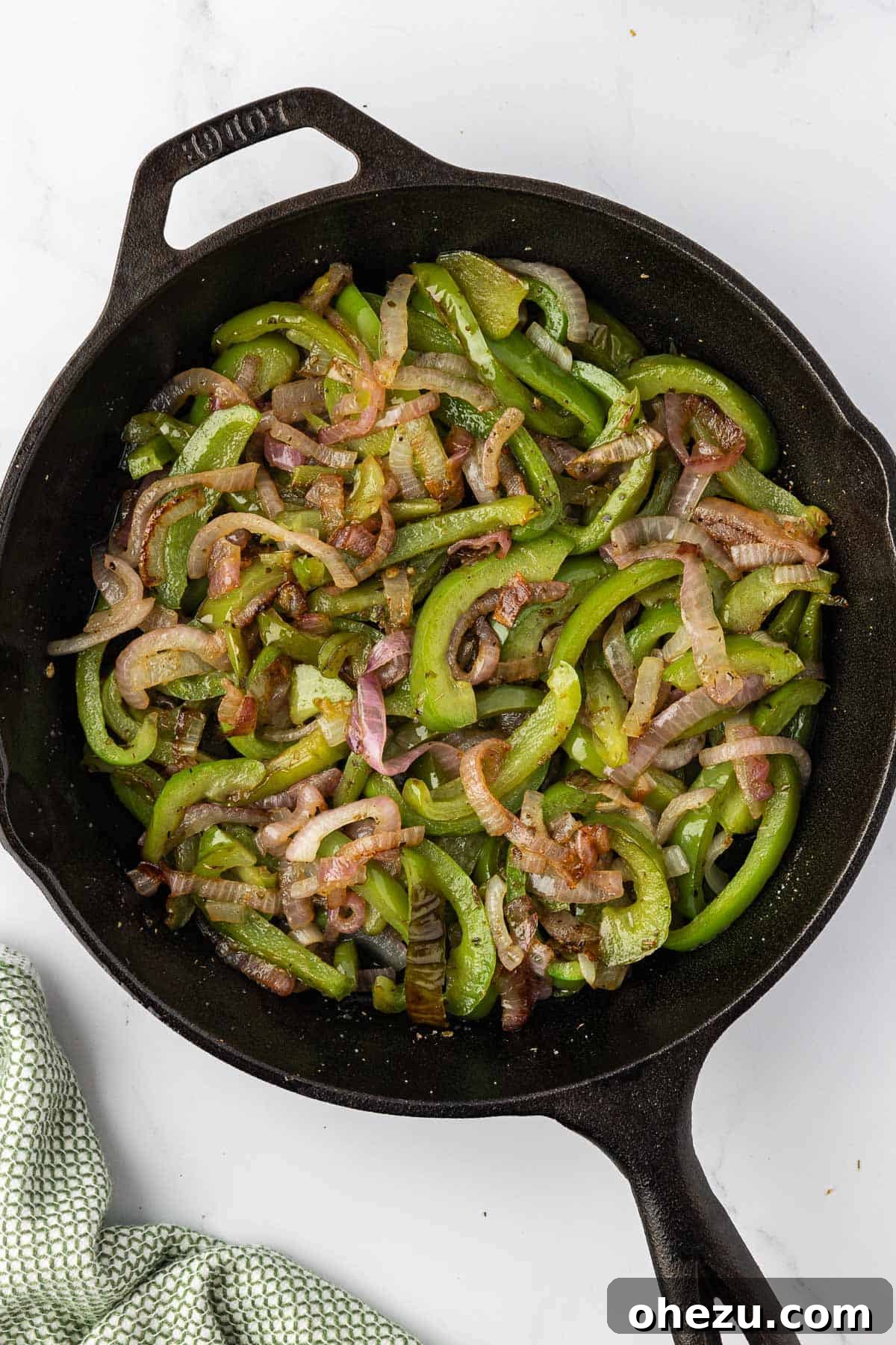 Zesty Fajita Medley 8 Chipotle-style fajita veggies sizzling in a skillet, nearly ready.