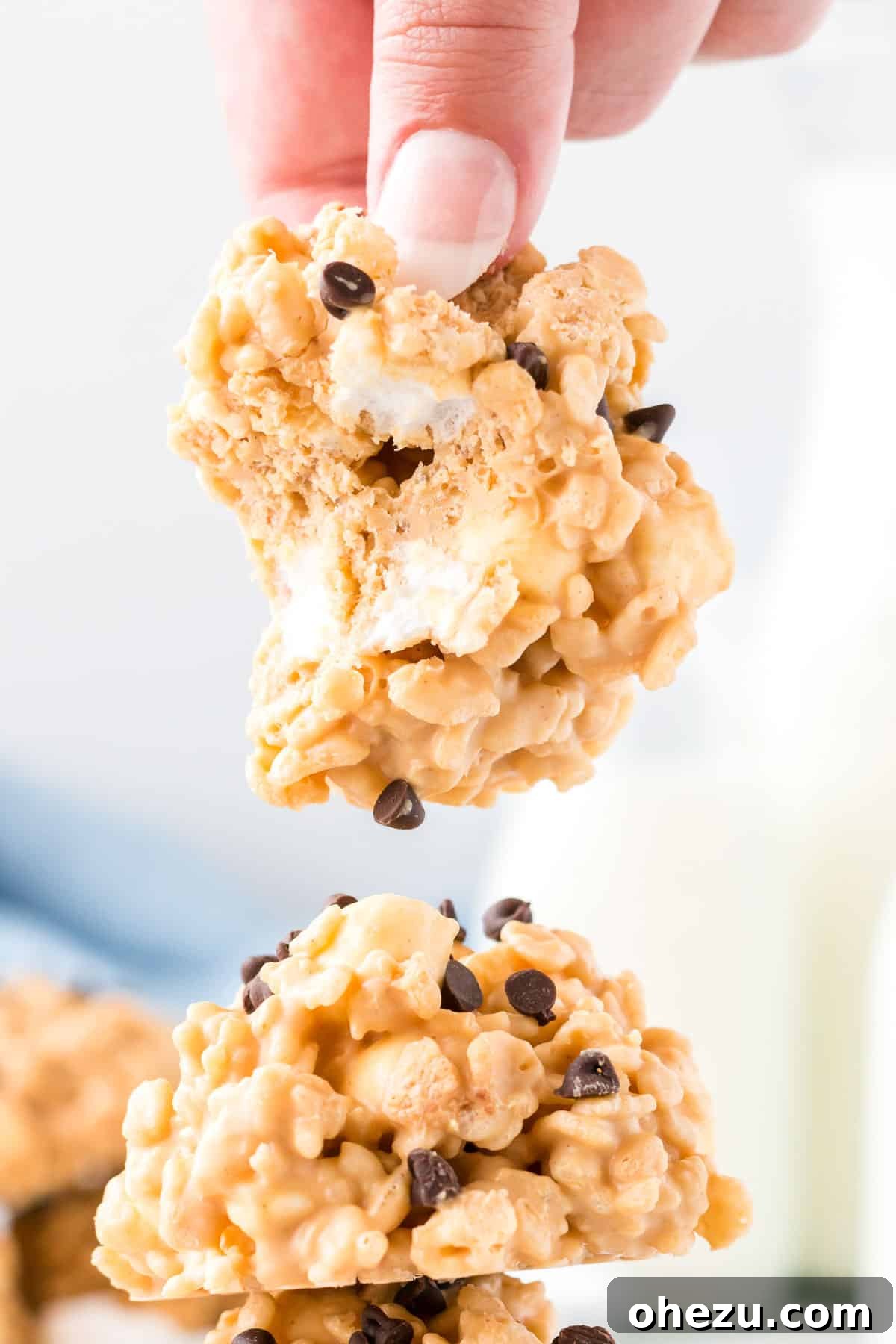 Kitchen Sink Cookies 14 A no bake avalanche cookie with a bite taken out, showcasing its delicious layers and perfect consistency