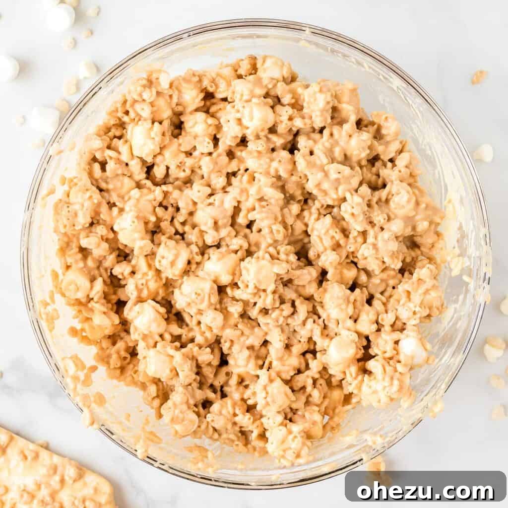 Kitchen Sink Cookies 10 All avalanche cookie ingredients thoroughly mixed together in a bowl, creating a sticky, uniform mass
