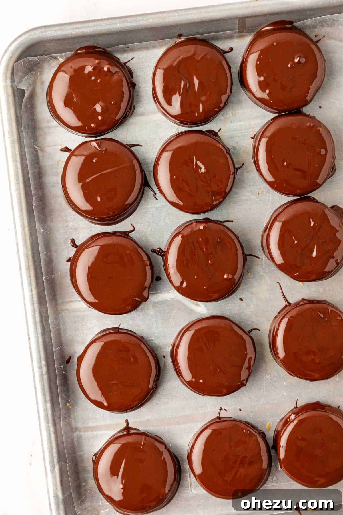 Ritz Cracker Cookies covered in chocolate and ready for toppings