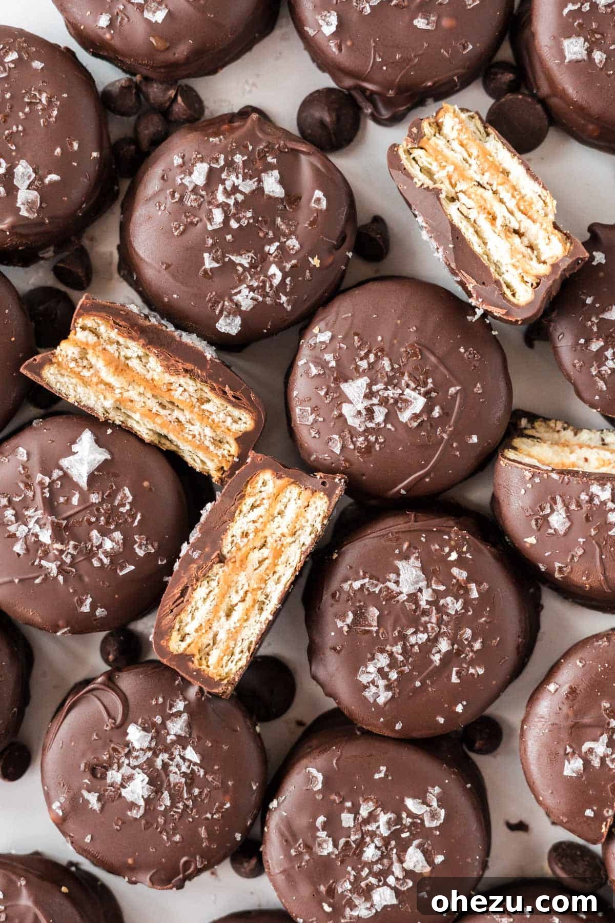Ritz Cracker Cookies, some whole and one cut in half to show the layers