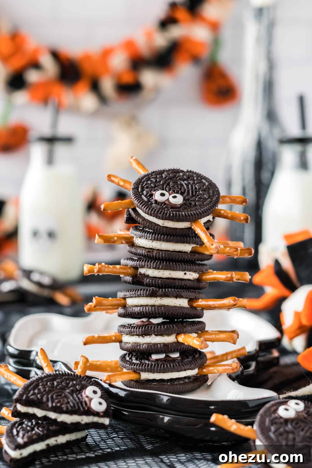 Spooky Oreo Spiders 12 Stacked Oreo spider cookies, showing off their fun googly eyes and pretzel legs