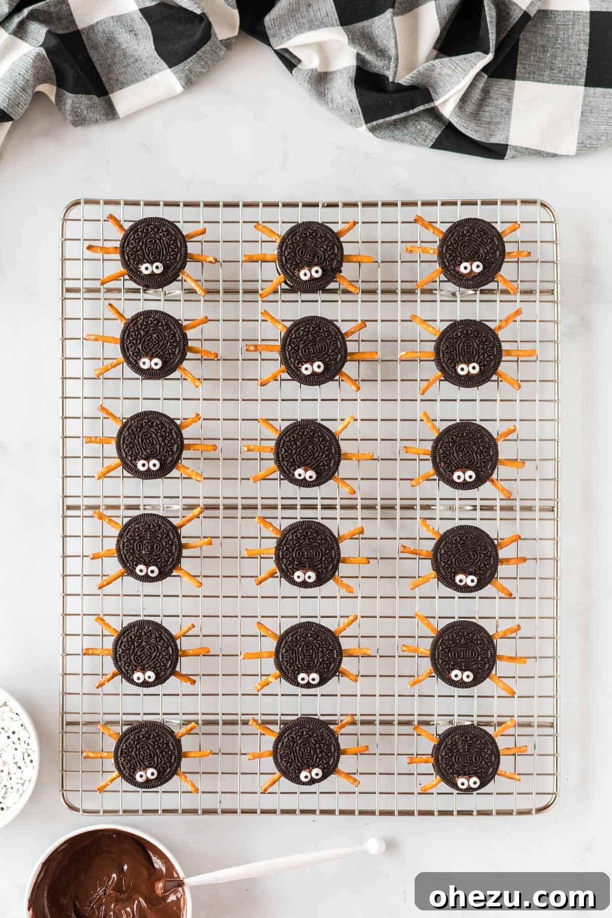 Spooky Oreo Spiders 10 Finished Oreo spiders with pretzel legs and googly eyes, ready to chill
