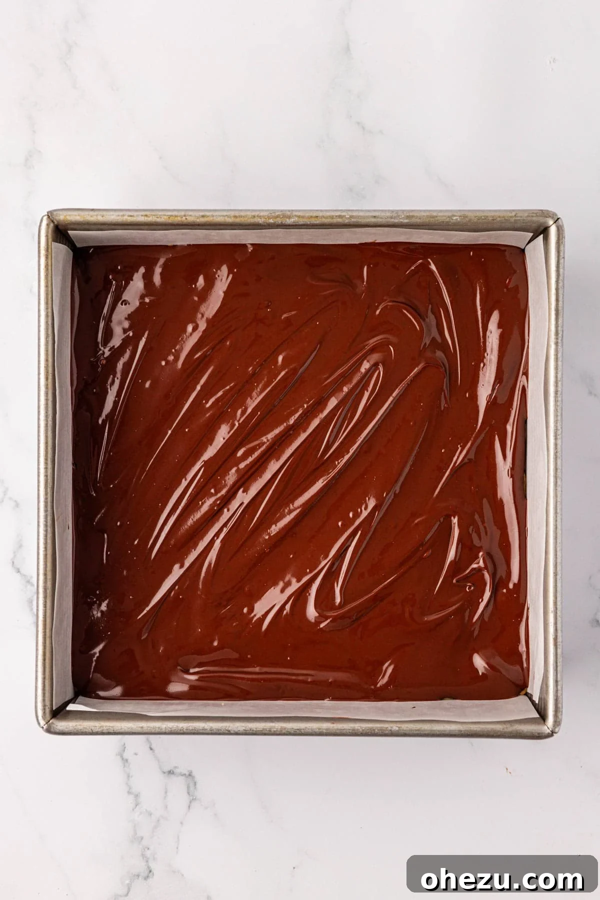 The protein bars fully covered with a smooth layer of melted chocolate
