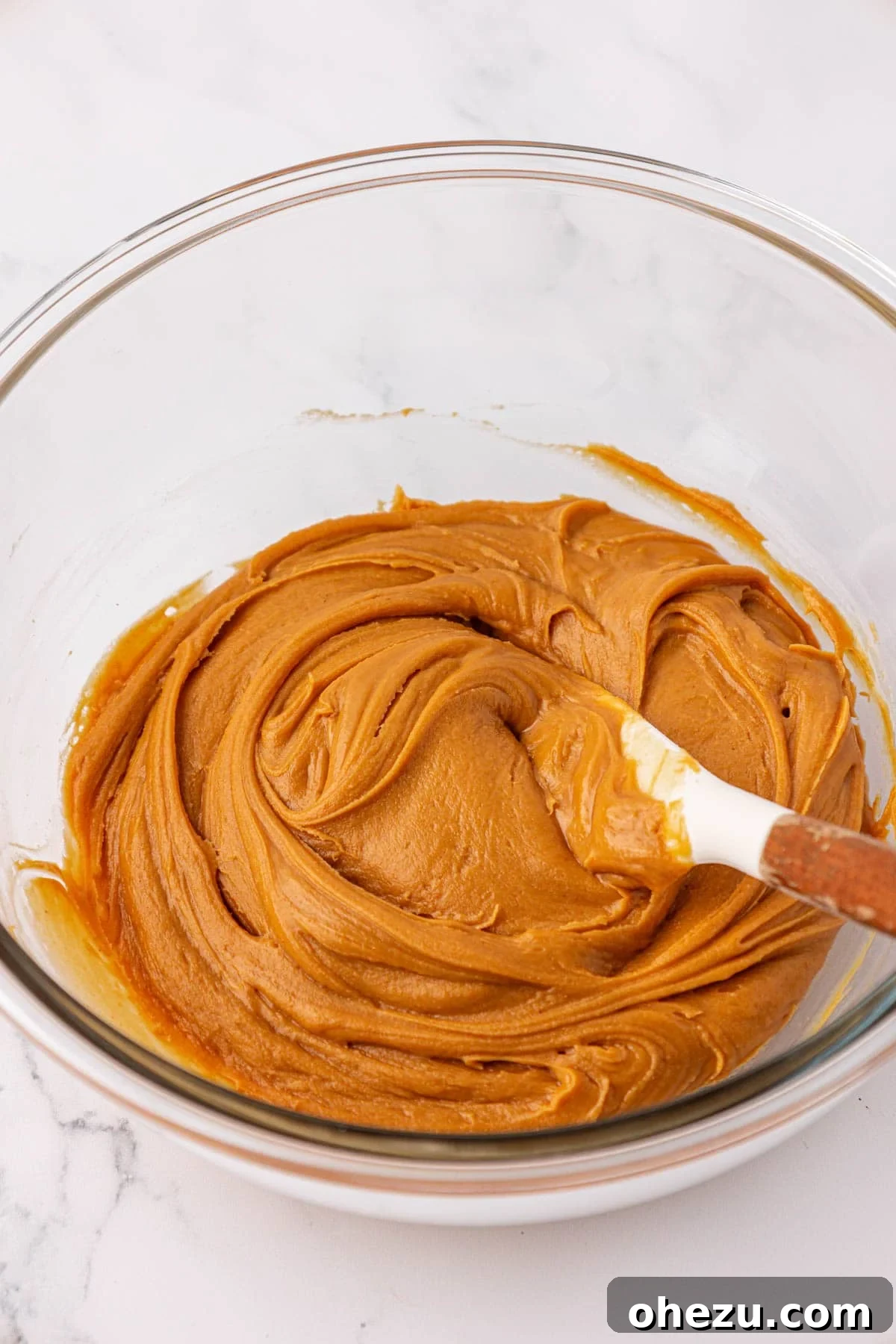 Peanut butter and honey mixed together into a smooth paste