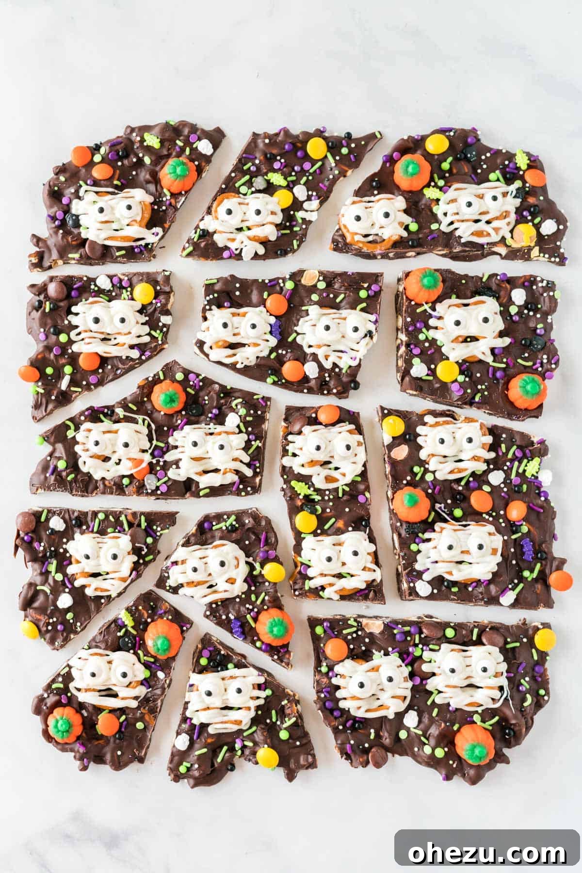 Pieces of Halloween bark on a plate, ready to be served
