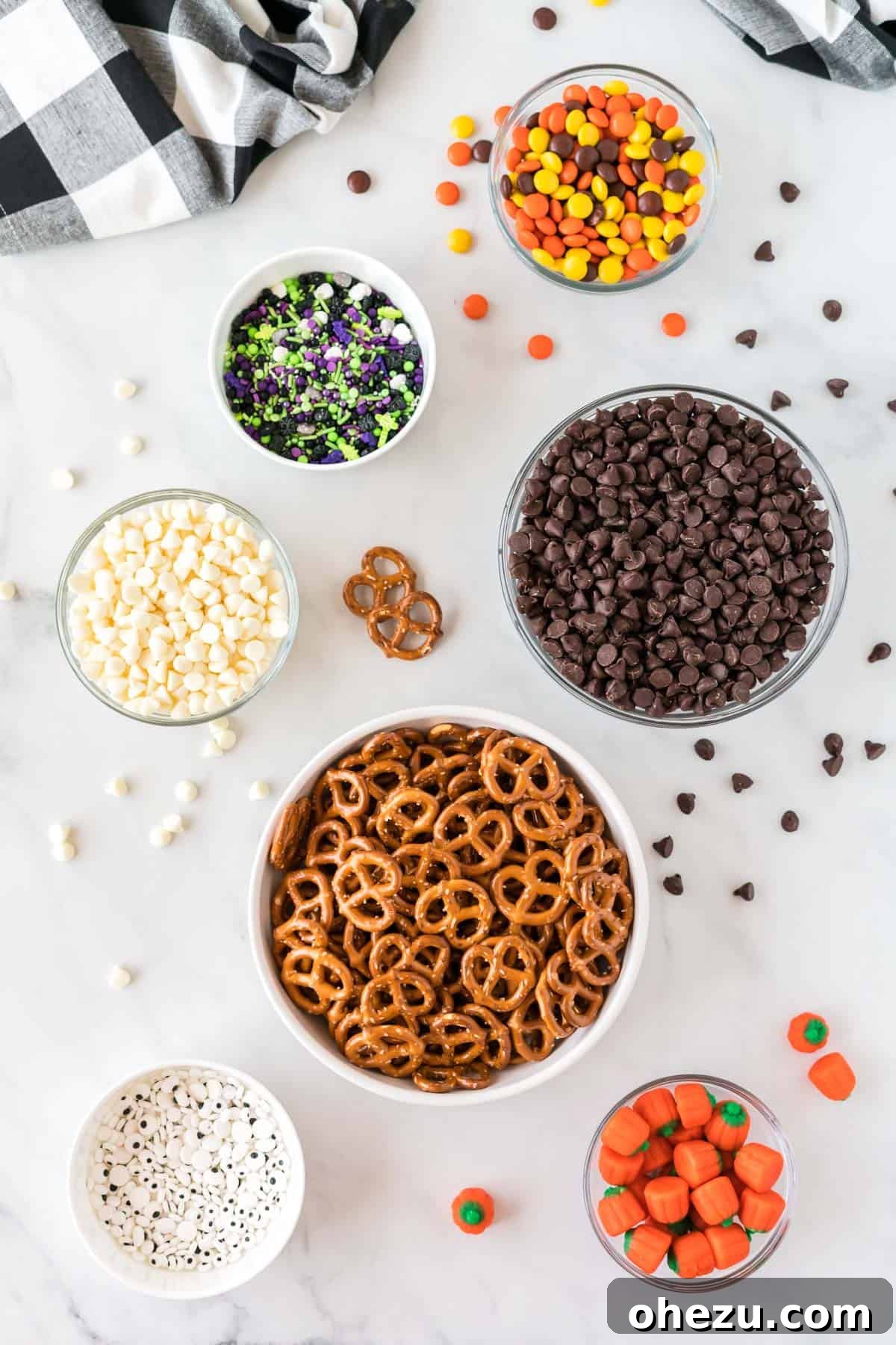 Ingredients laid out on a table to make Halloween bark
