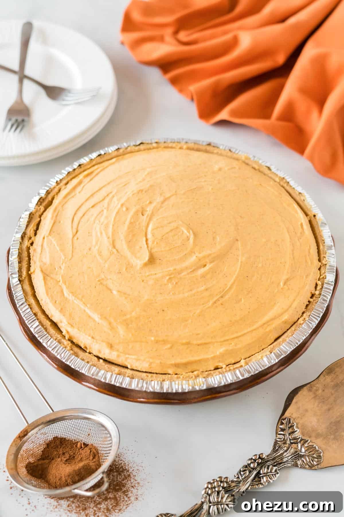 Velvet Pumpkin Pie 15 A whole, beautiful no-bake pumpkin pie, perfectly chilled and ready to be sliced and served.