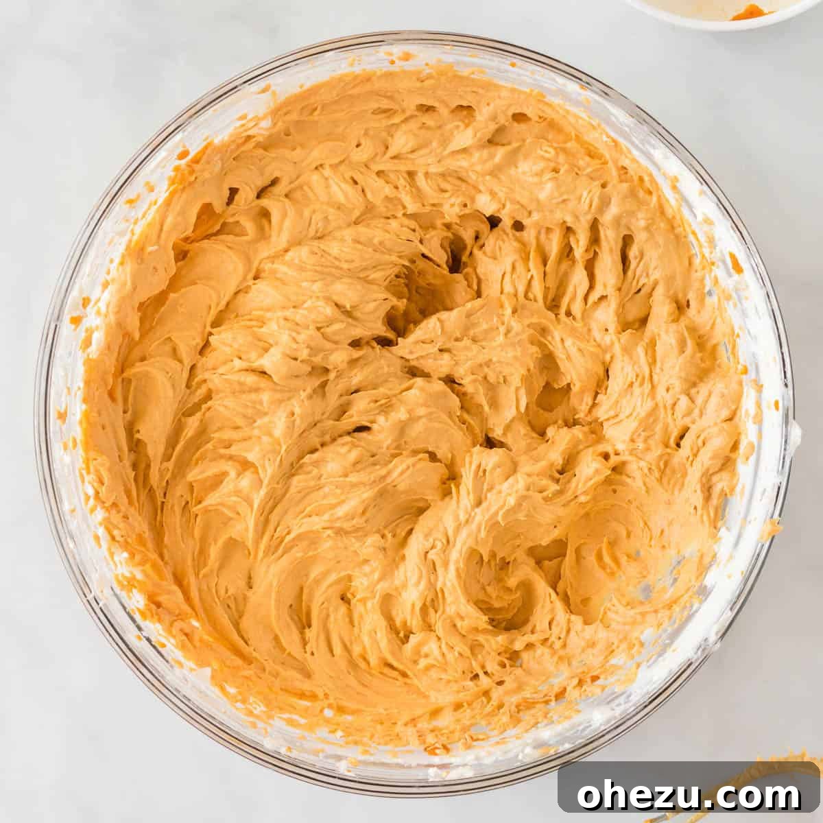 Velvet Pumpkin Pie 7 The pumpkin, cream cheese, vanilla, brown sugar, and pumpkin pie spice mixture whipped together until smooth and creamy.
