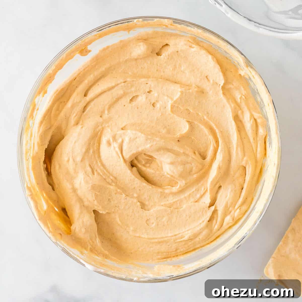 Velvet Pumpkin Pie 9 The fully combined pumpkin cream pie filling, showing its smooth, fluffy, and airy texture.