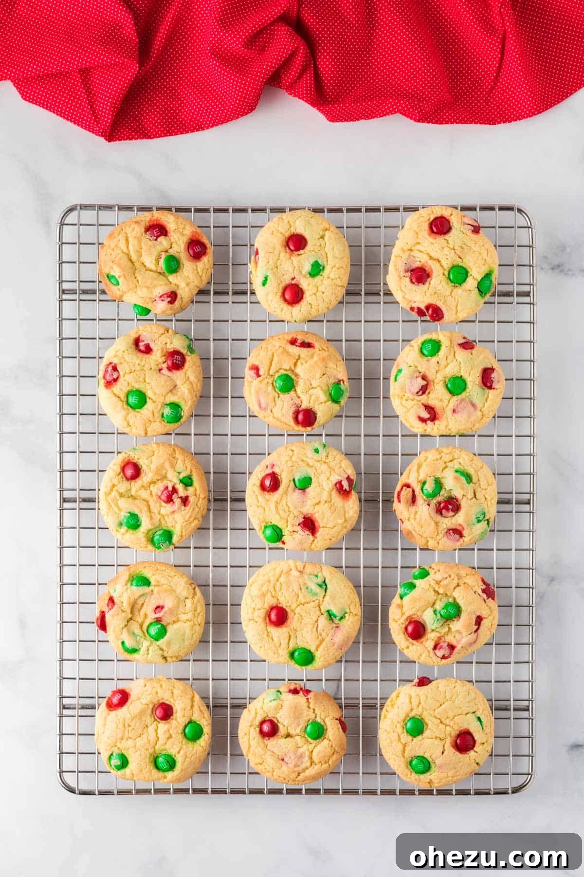 Holiday Cookie Magic from a Box 10 Baked cake mix Christmas cookies transferred to a wire rack to cool, maintaining their soft texture.