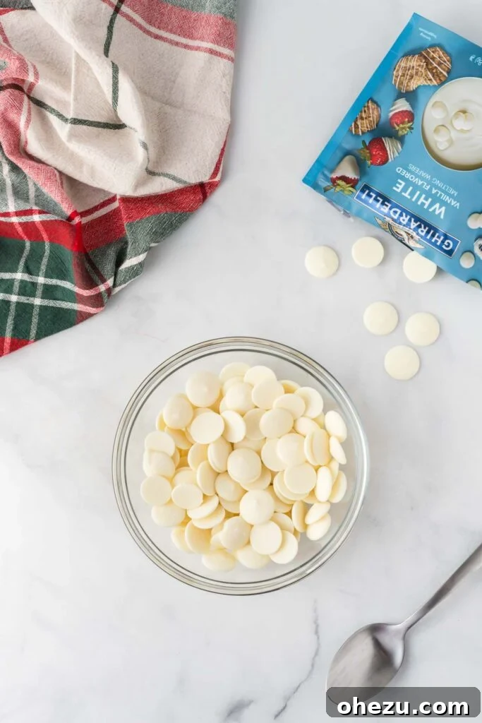 Decadent Holiday Oreo Treats 13 White vanilla melting wafers in a bowl, ready for melting