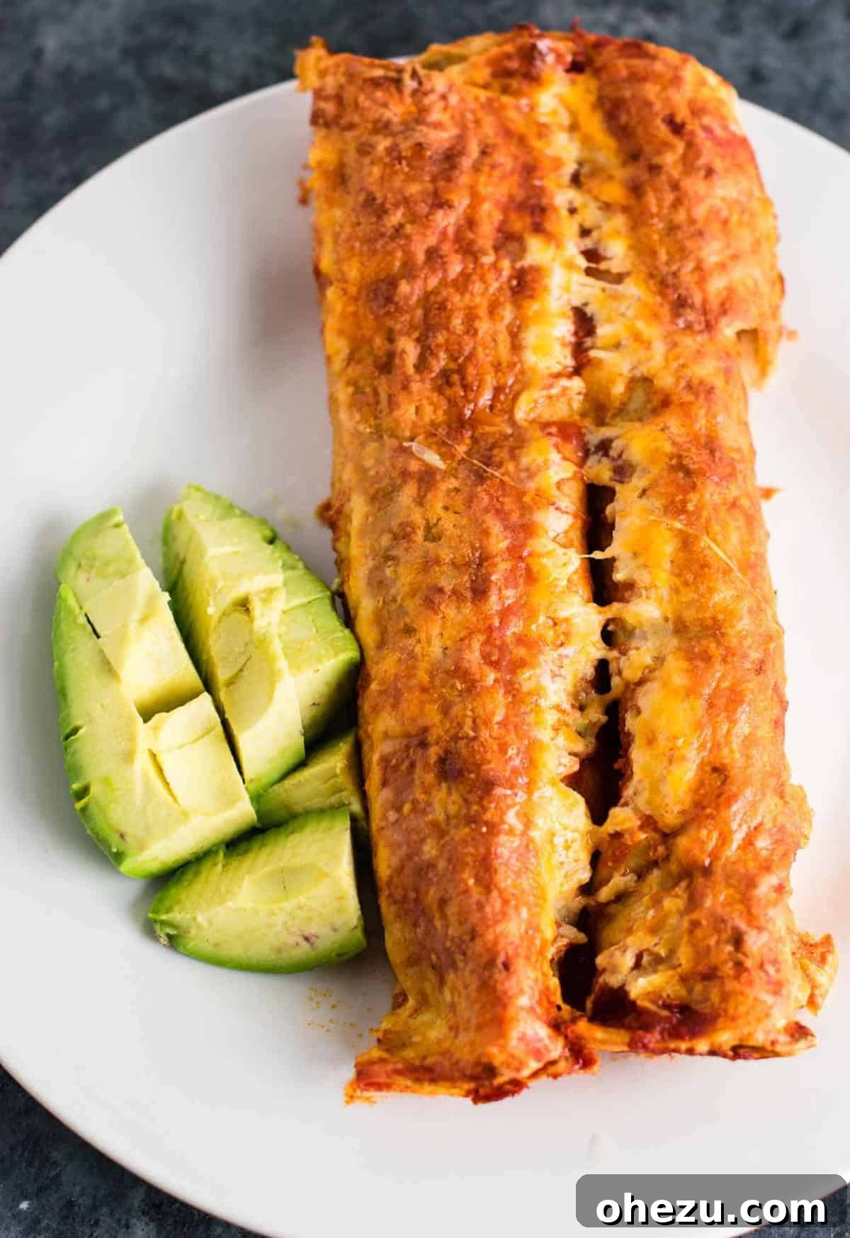 Velvety Bean Enchiladas 2 refried bean enchiladas - easy meatless mexican recipe. Made with homemade refried beans and mushrooms.