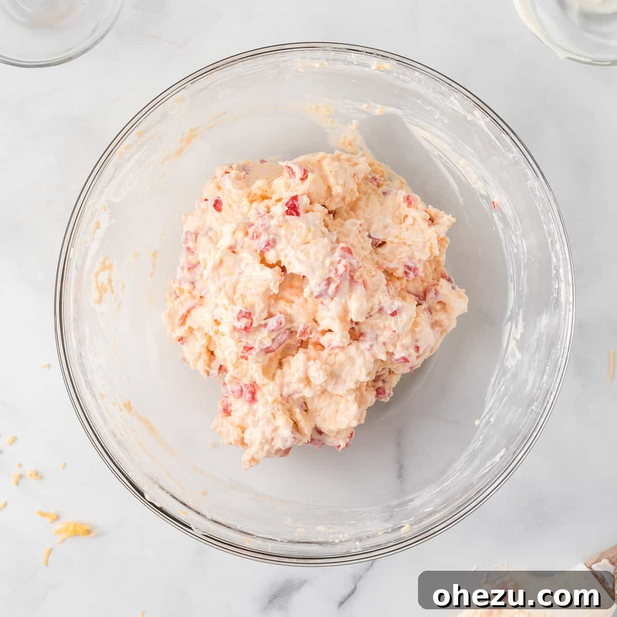 fully mixed pimento cheese ball filling in a bowl, ready to be chilled