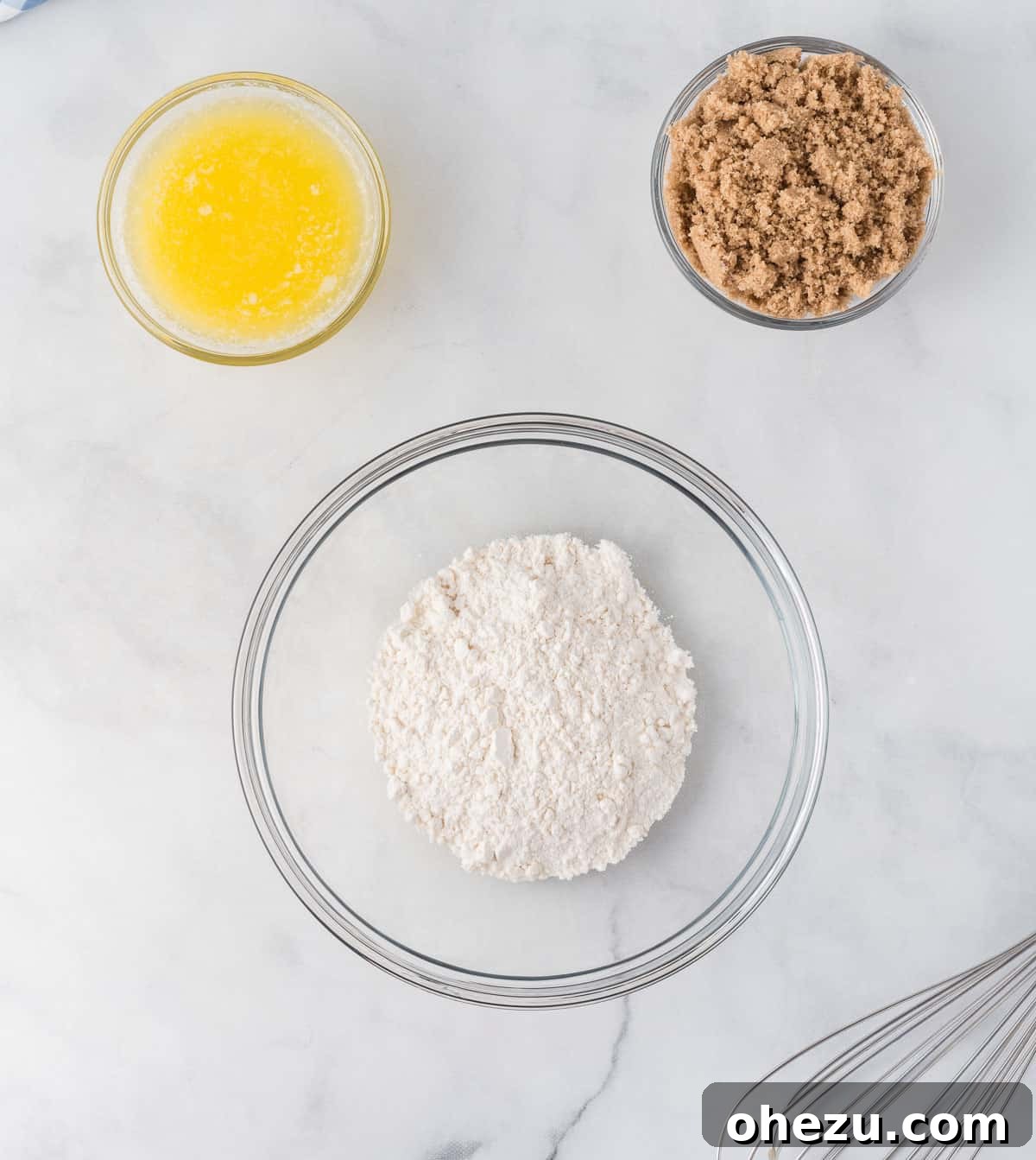Ingredients for the streusel topping: flour, brown sugar, and melted butter, prepared for mixing