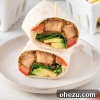 tofu wraps stacked on a plate