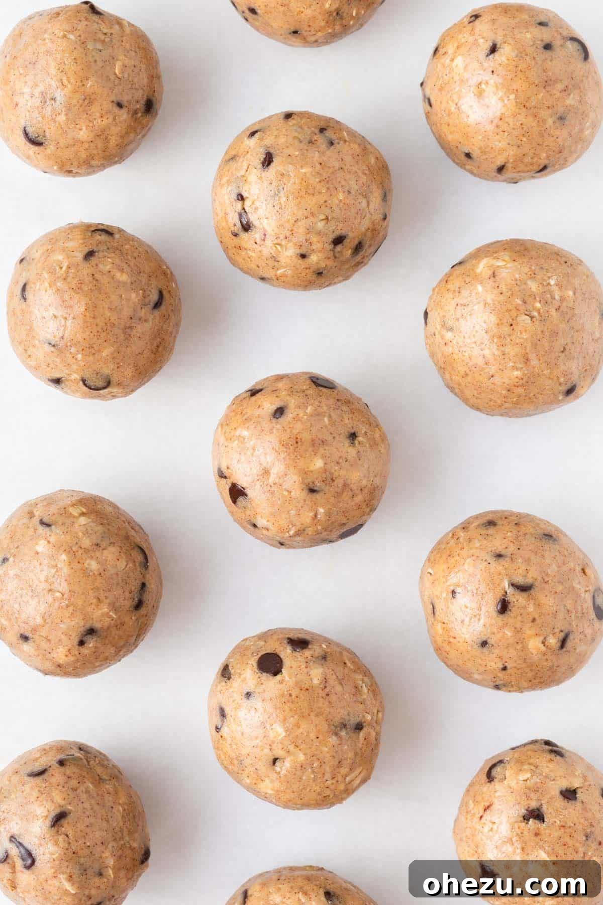 Wholesome Almond Butter Protein Bites 9 A neatly organized container of almond butter energy balls, showcasing how to store them for optimal freshness in the fridge or freezer, perfect for meal prep.