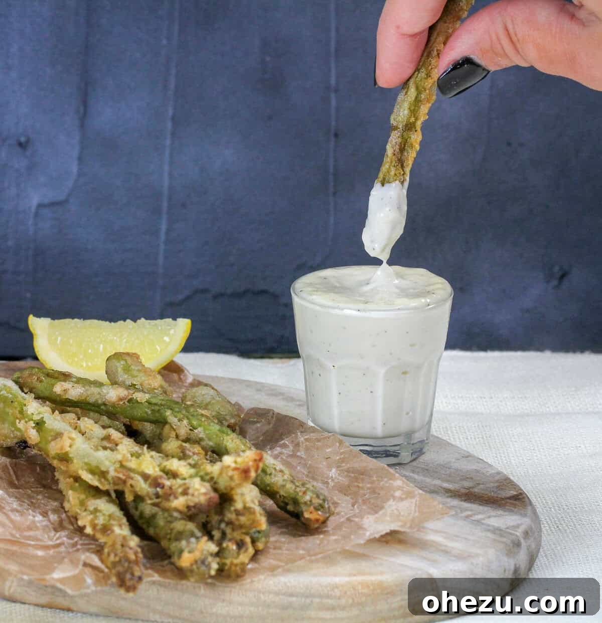 Burgerville-Inspired Crispy Asparagus Fries with Garlic Aioli 3 Golden-brown Fried Asparagus Spears with Aioli Dip