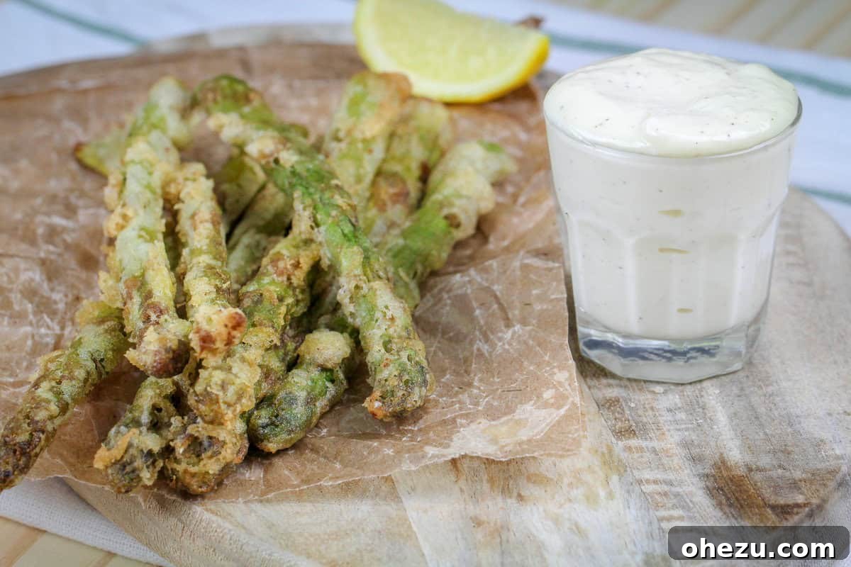 Burgerville-Inspired Crispy Asparagus Fries with Garlic Aioli 6 Platter of Crispy Fried Asparagus with a Bowl of Garlic Aioli