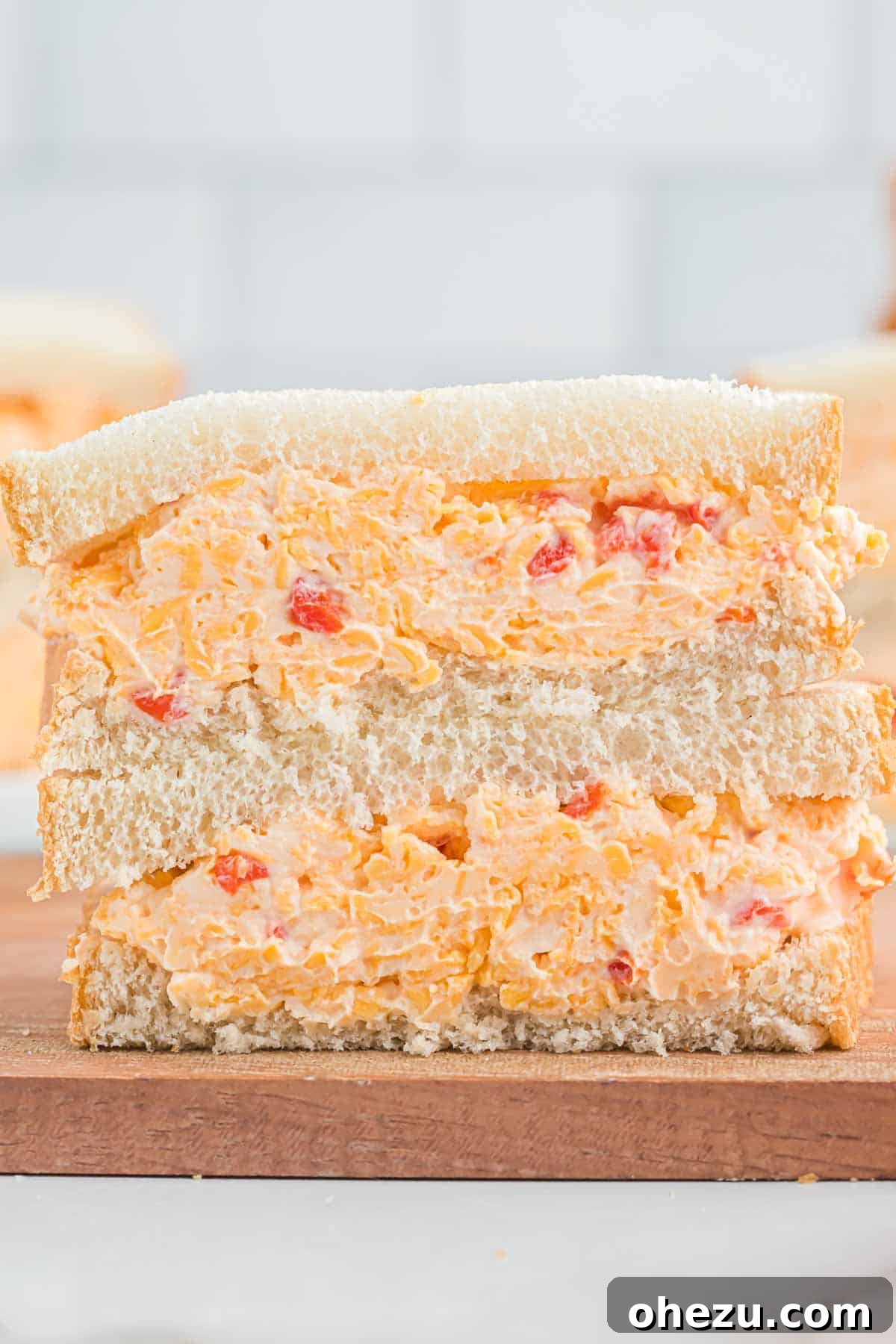 pimento cheese sandwich cut in half and stacked