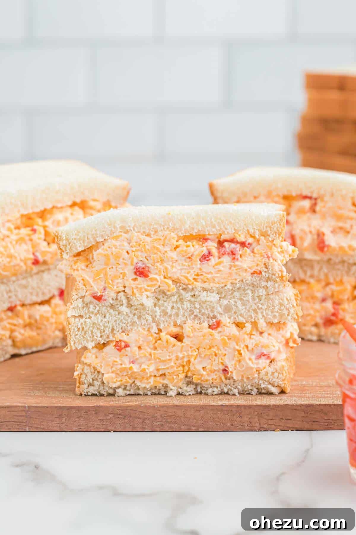 pimento cheese sandwich cut in half and stacked