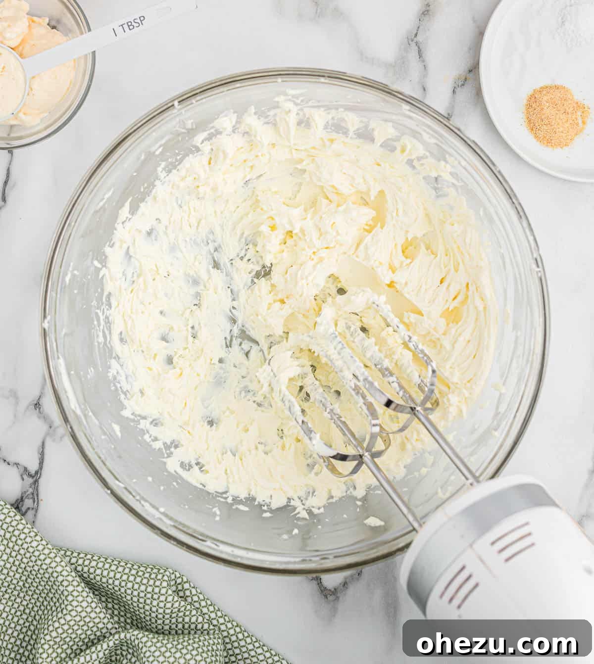 cream cheese whipped together in a bowl