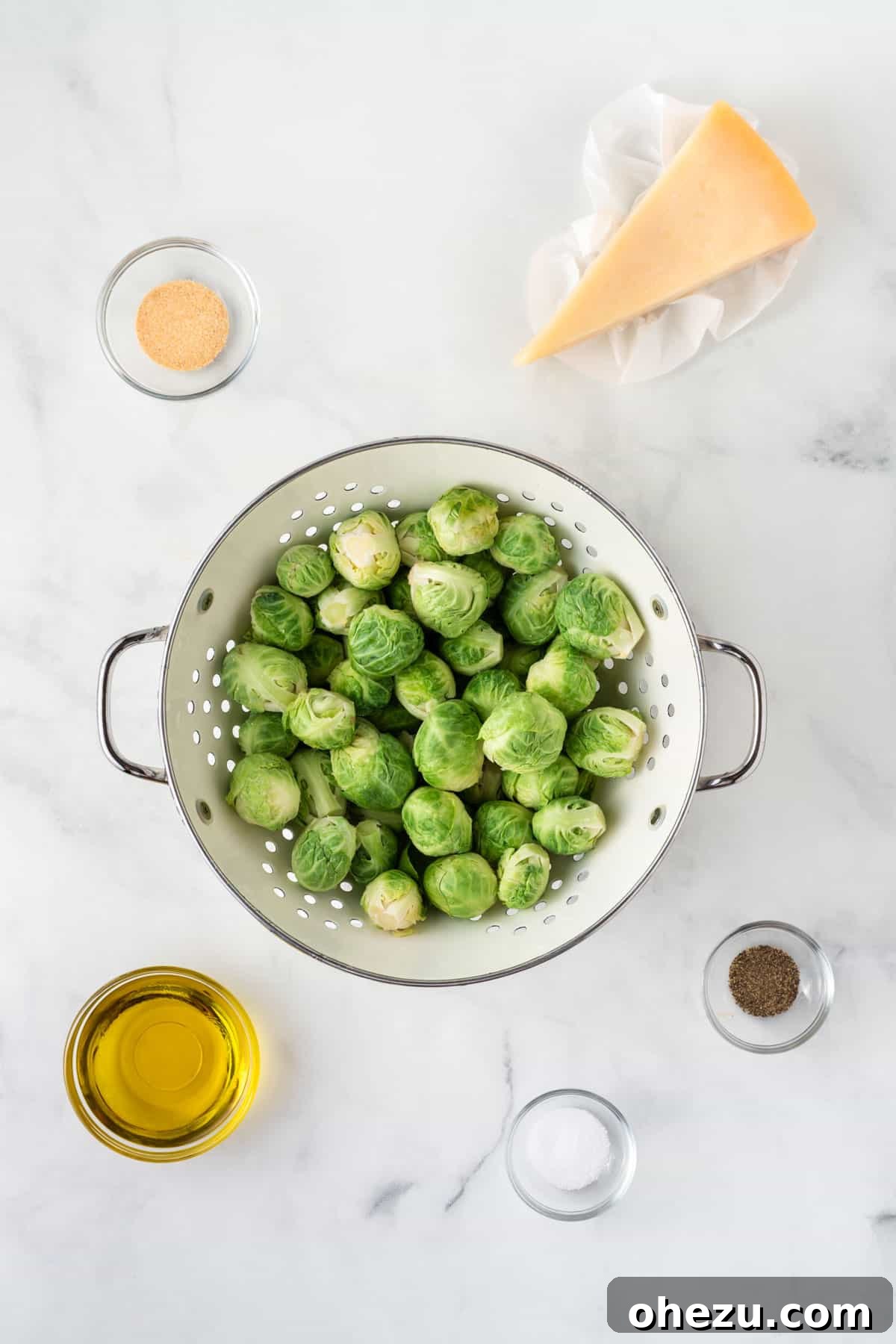 Perfectly Crispy Air Fryer Brussels Sprouts 3 Ingredients for making air fryer Brussels sprouts: fresh sprouts, Parmesan cheese, olive oil, and spices