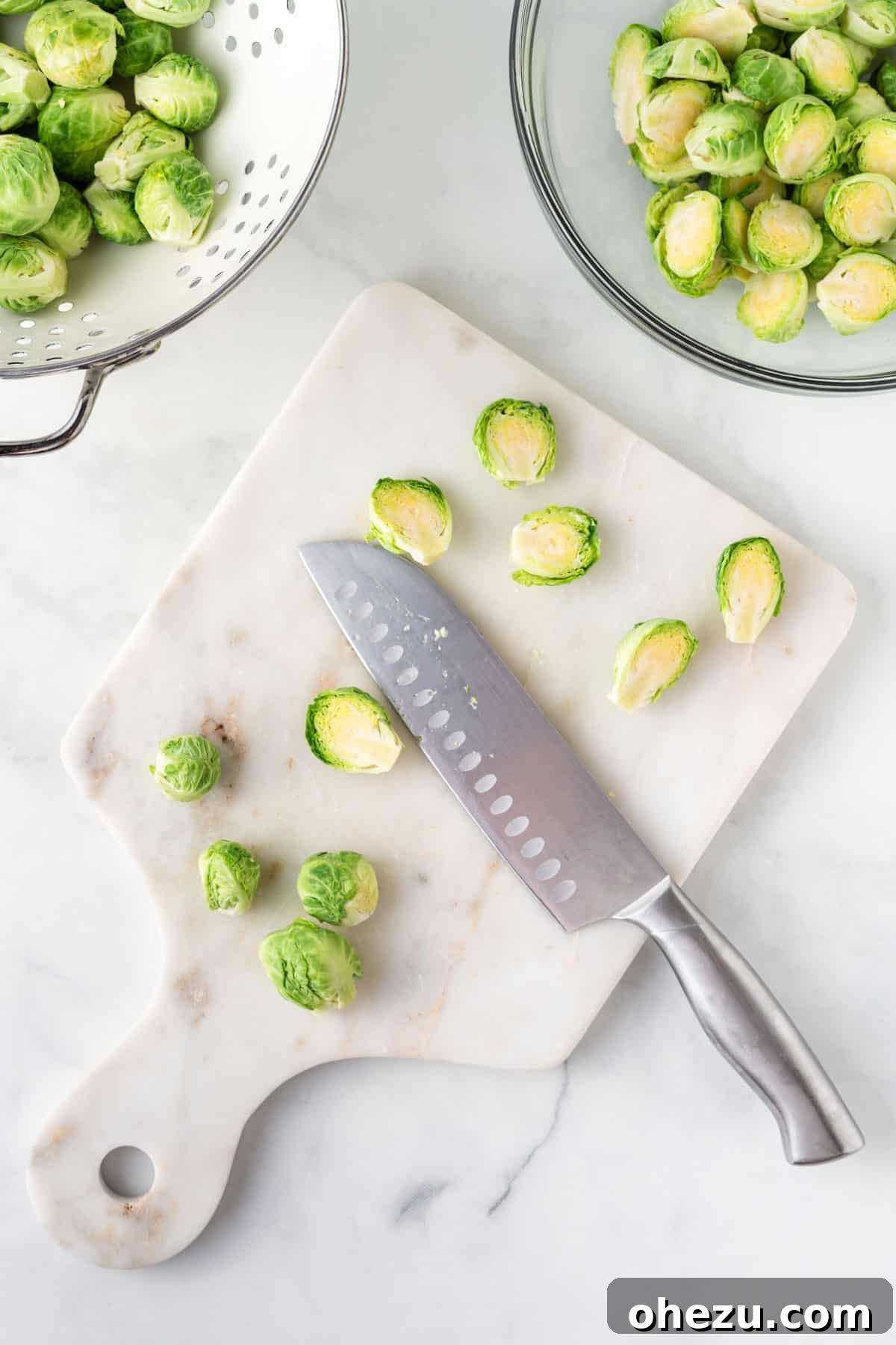 Perfectly Crispy Air Fryer Brussels Sprouts 4 Cutting fresh Brussels sprouts in half lengthwise