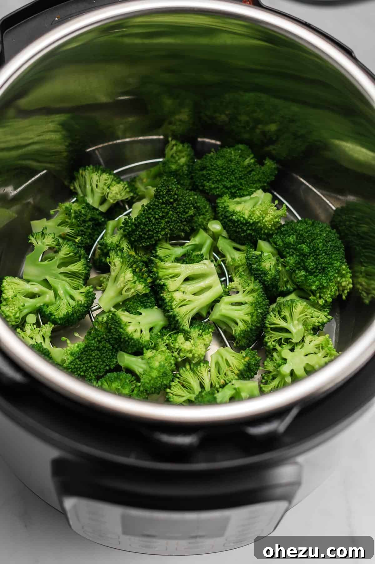 Effortless Instant Pot Broccoli 7 Overview shot of all the perfectly steamed broccoli in the Instant Pot