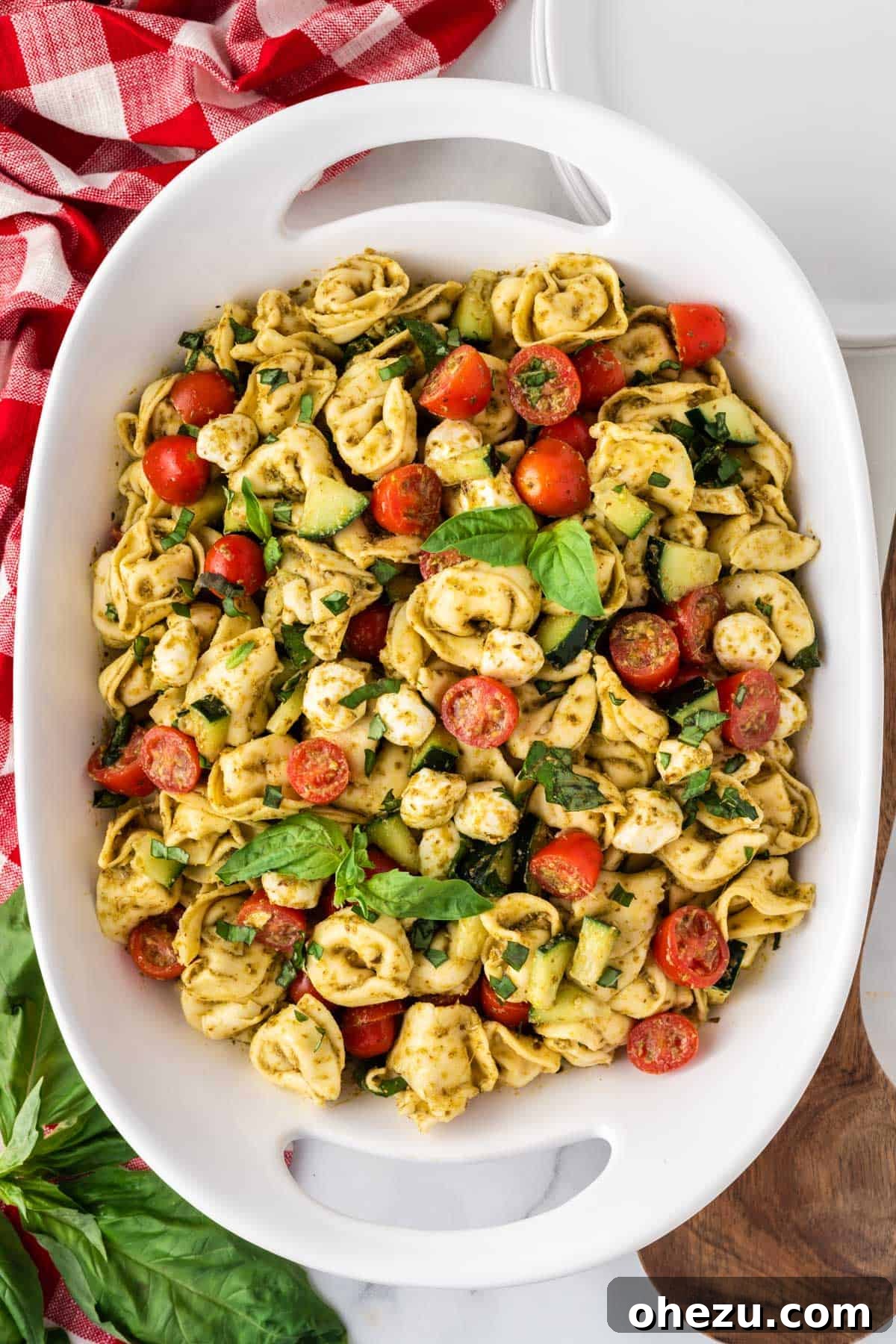 Flavorful Tortellini Pasta Salad 8 tortellini pasta salad in a white serving dish