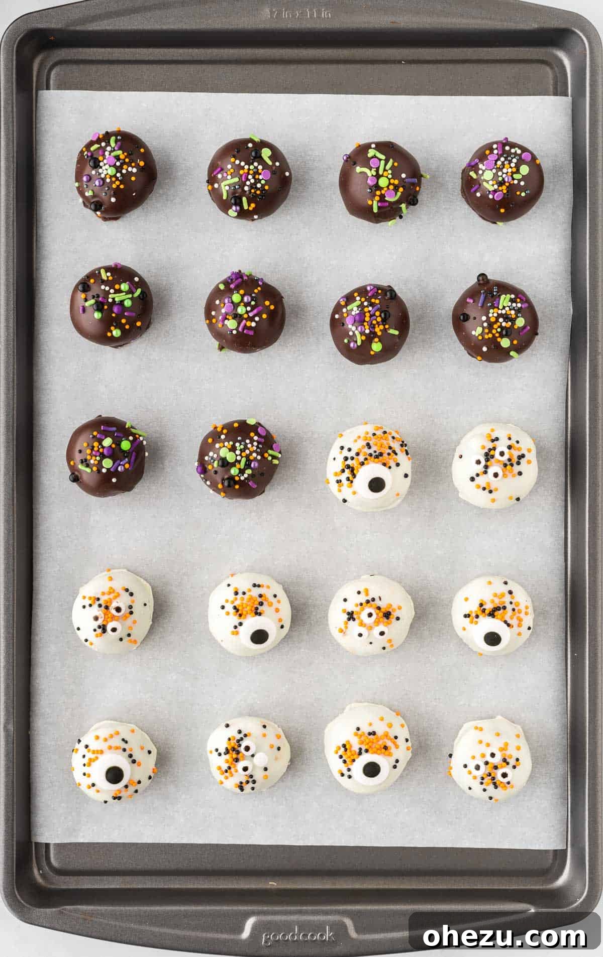 Wicked Oreo Truffles 16 Finished Halloween Oreo balls resting on a baking sheet, with chocolate coatings set