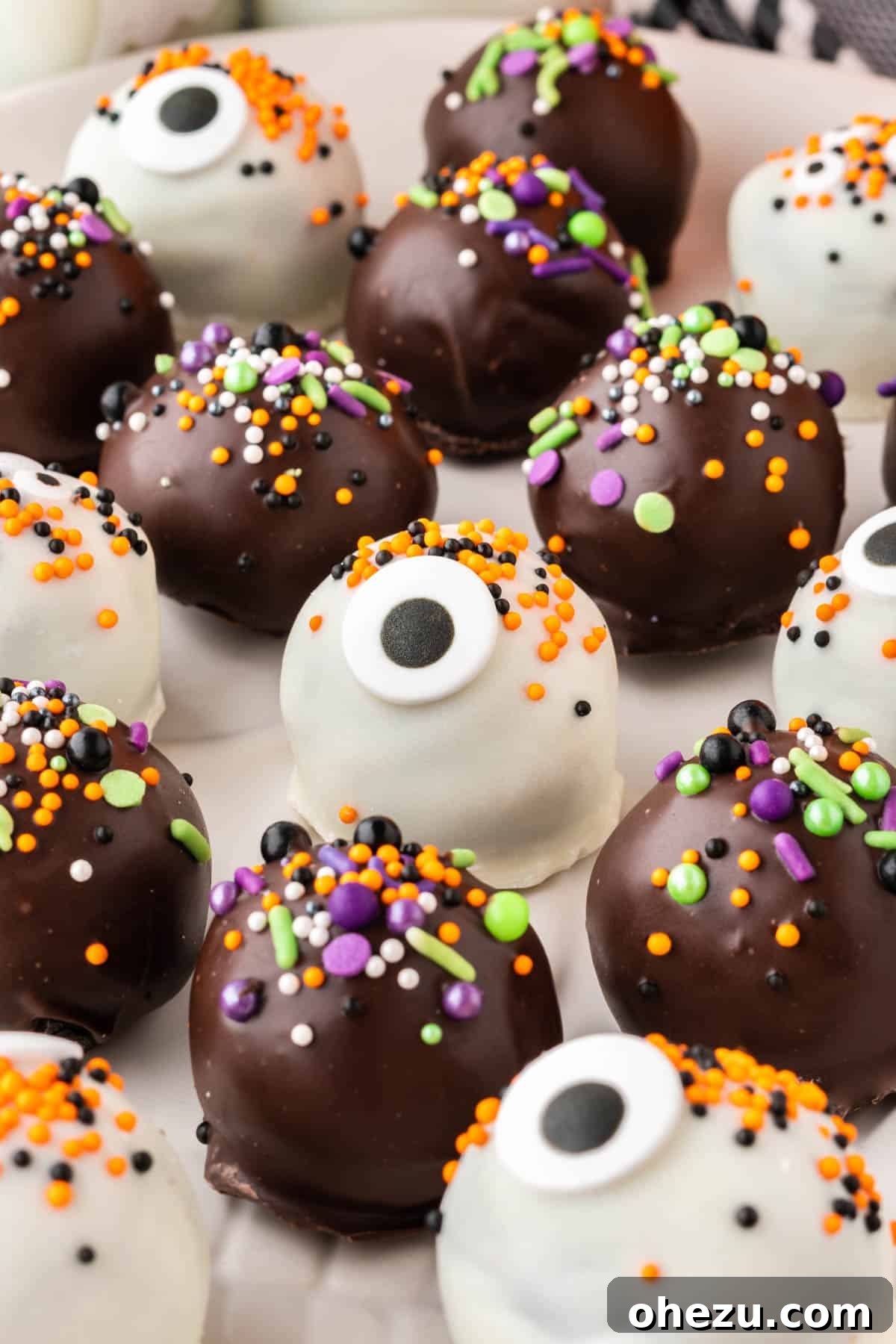 Wicked Oreo Truffles 17 A beautifully arranged platter of Halloween decorated Oreo balls, ready for a party