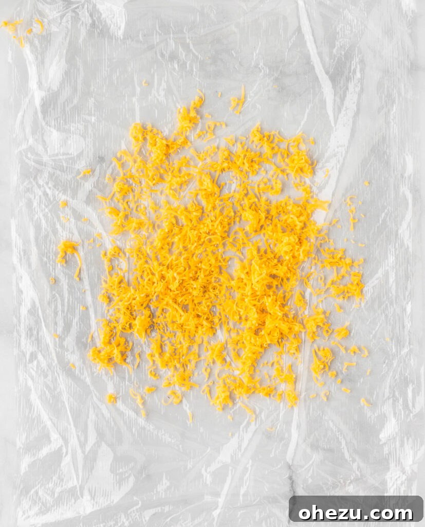 cheddar cheese on saran wrap