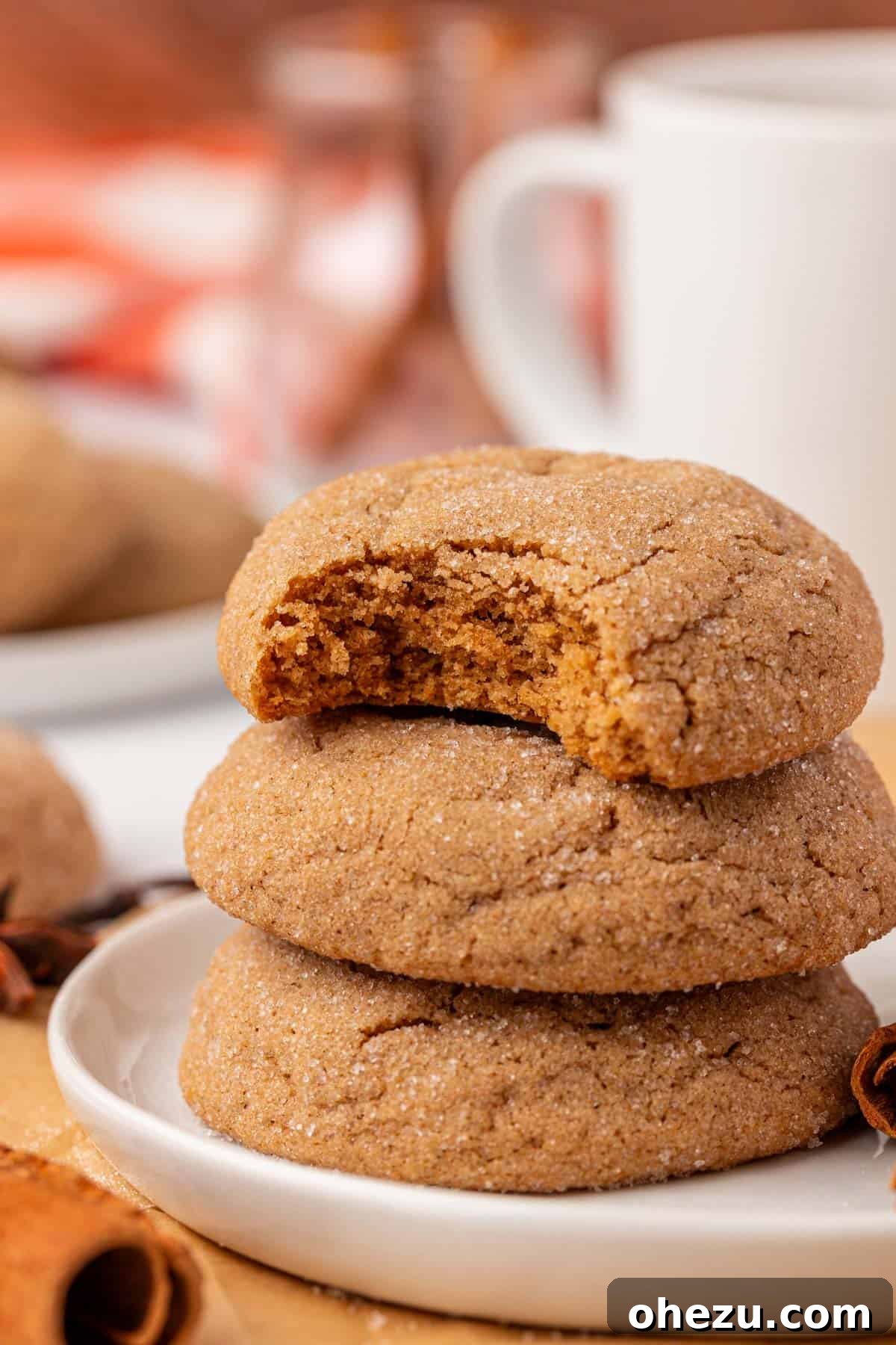 An enticing stack of golden-brown Cake Mix Spice Cookies, highlighting their perfect texture and sugary coating, inviting a taste.