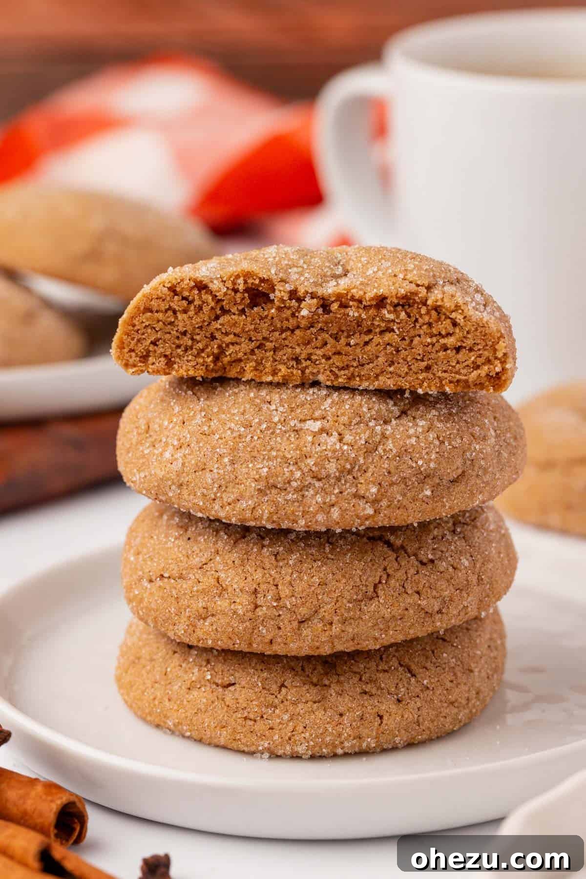 A vibrant close-up of baked Cake Mix Spice Cookies, perfectly round with a golden-brown hue and a shimmering sugar crust.