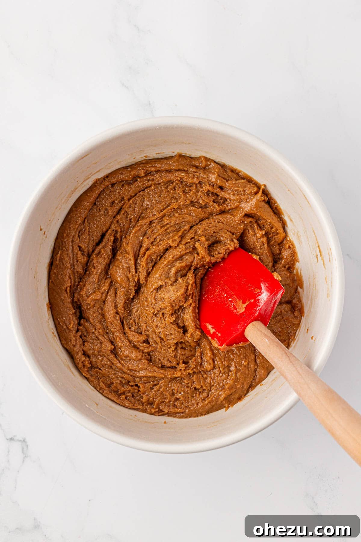 The fully mixed cake mix cookie dough, appearing thick and slightly sticky, ready for shaping.