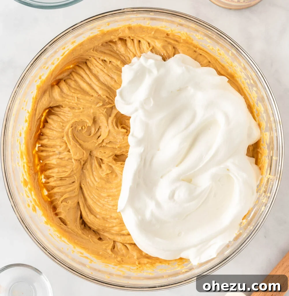smooth and creamy pumpkin cheesecake filling after folding